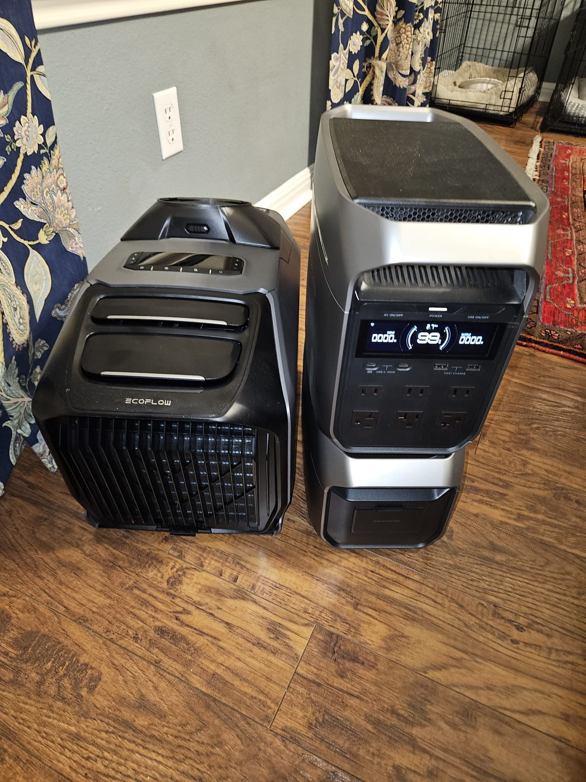 An EcoFlow WAVE 3 air conditioner beside a DELTA 3 Plus power station stacked on its Smart Extra Battery, standing on a wood floor indoors